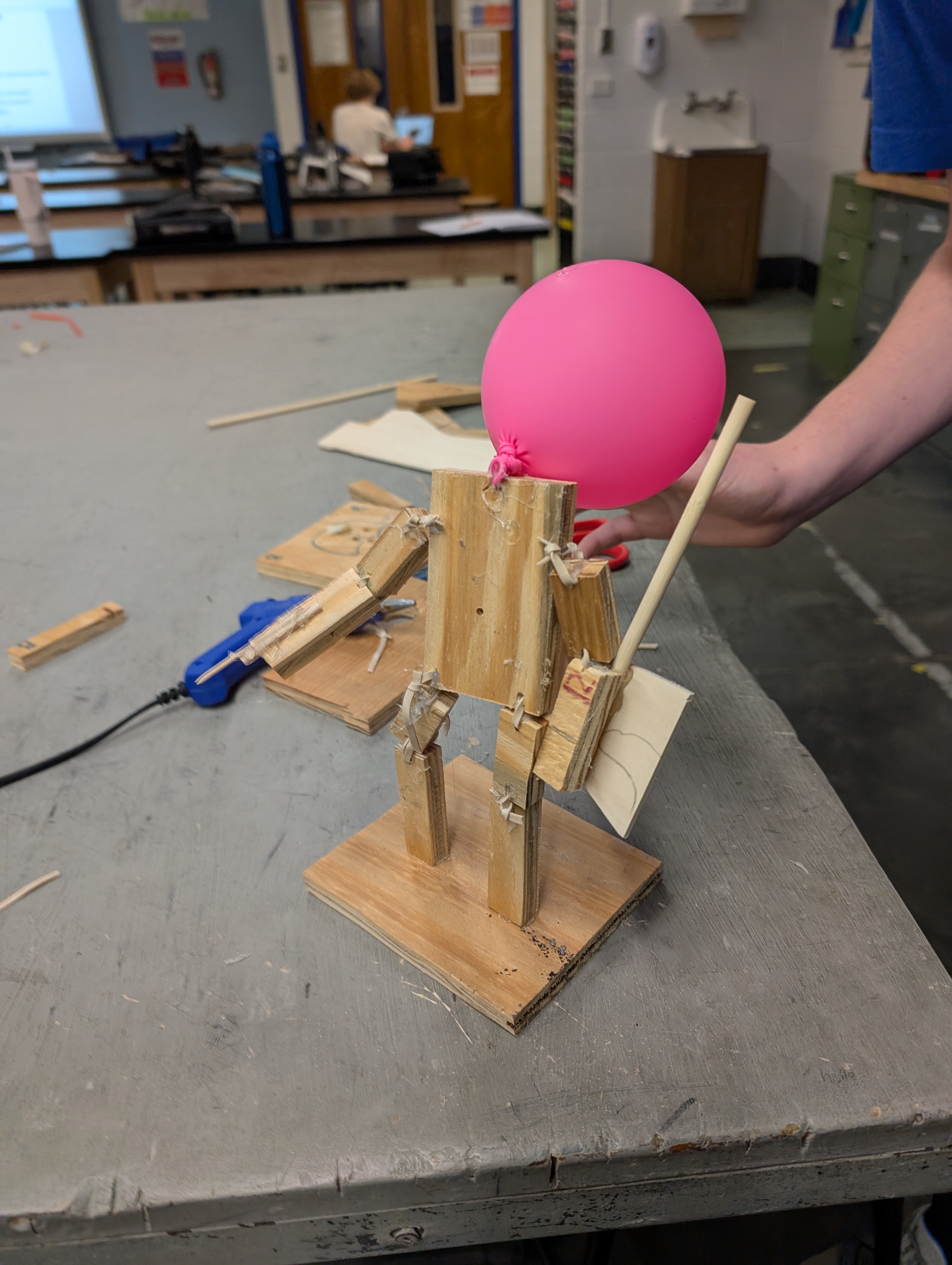 Balloon car using old CDs as wheels with straw axles
